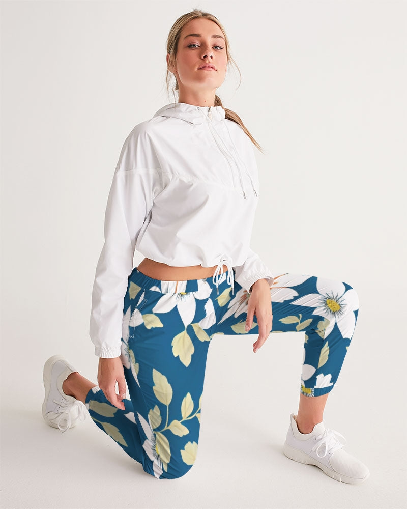 Dark blue background and white flower pattern Women's All-Over Print Track Pants