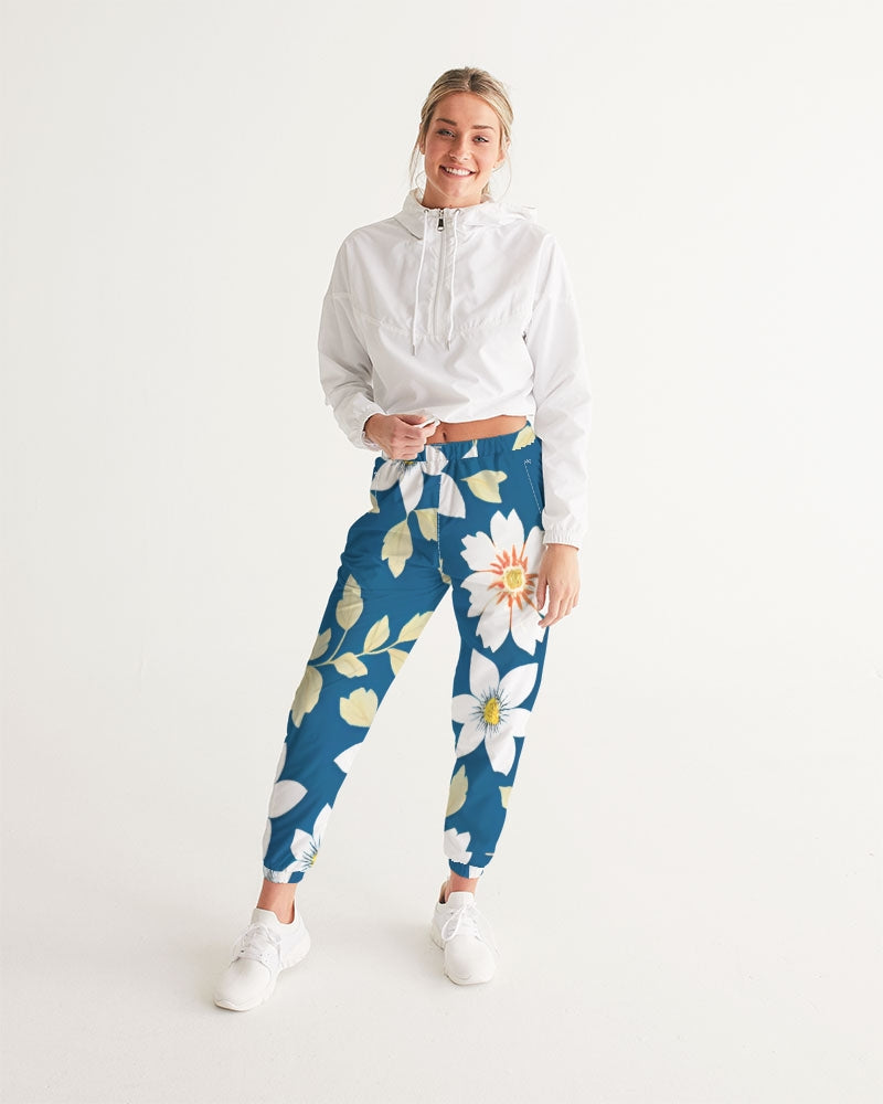 Dark blue background and white flower pattern Women's All-Over Print Track Pants