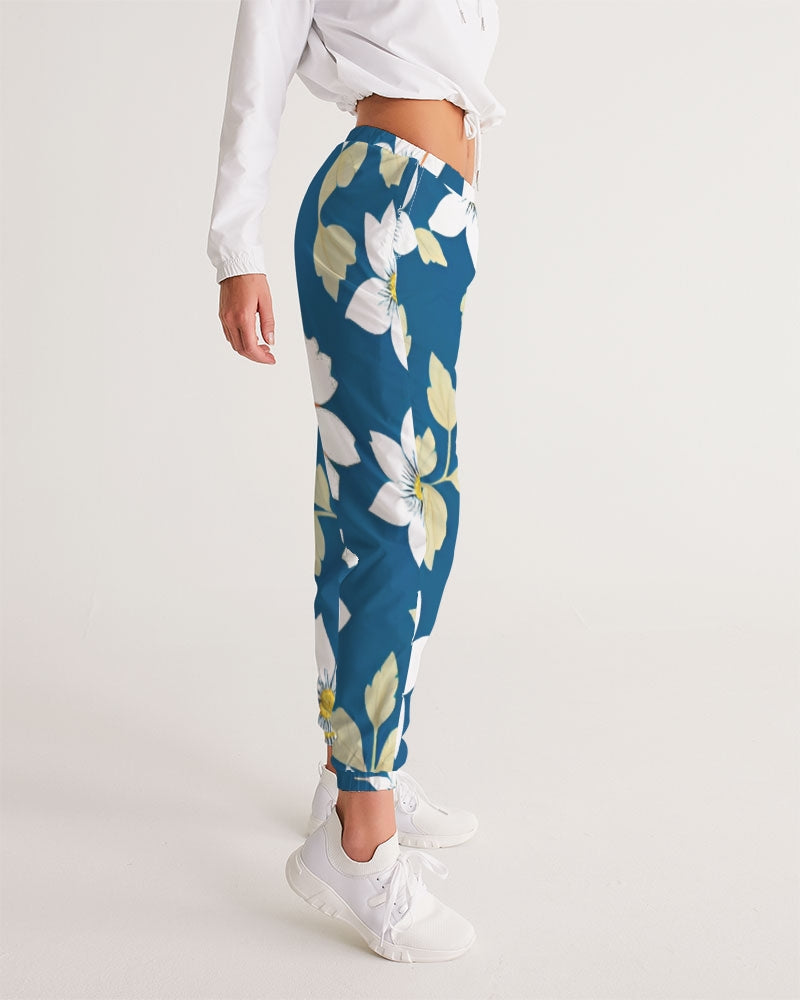 Dark blue background and white flower pattern Women's All-Over Print Track Pants