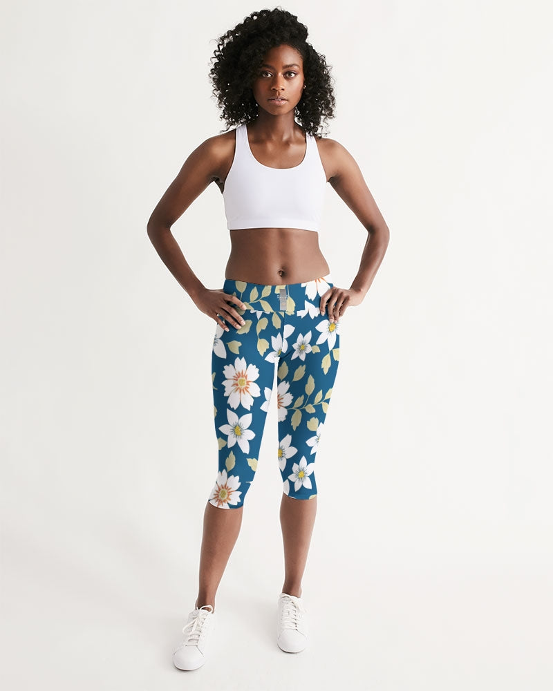 Dark blue background and white flower pattern Women's All-Over Print Mid-Rise Capri