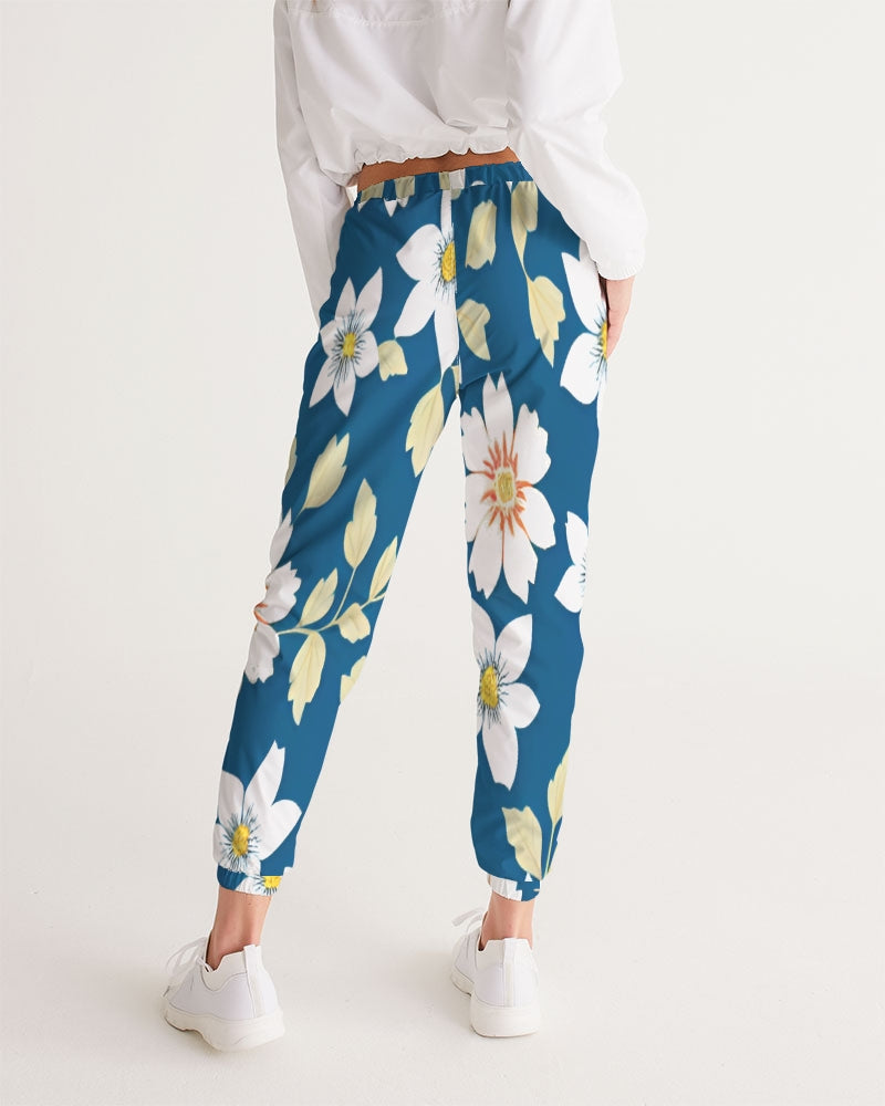 Dark blue background and white flower pattern Women's All-Over Print Track Pants