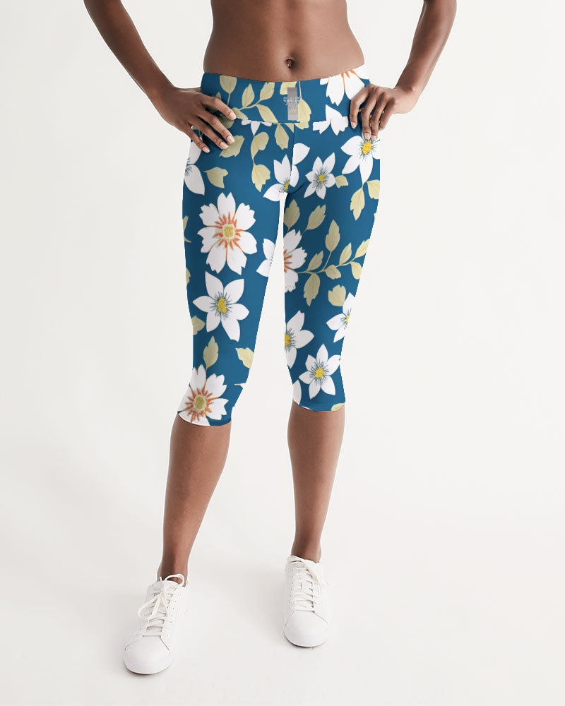 Dark blue background and white flower pattern Women's All-Over Print Mid-Rise Capri