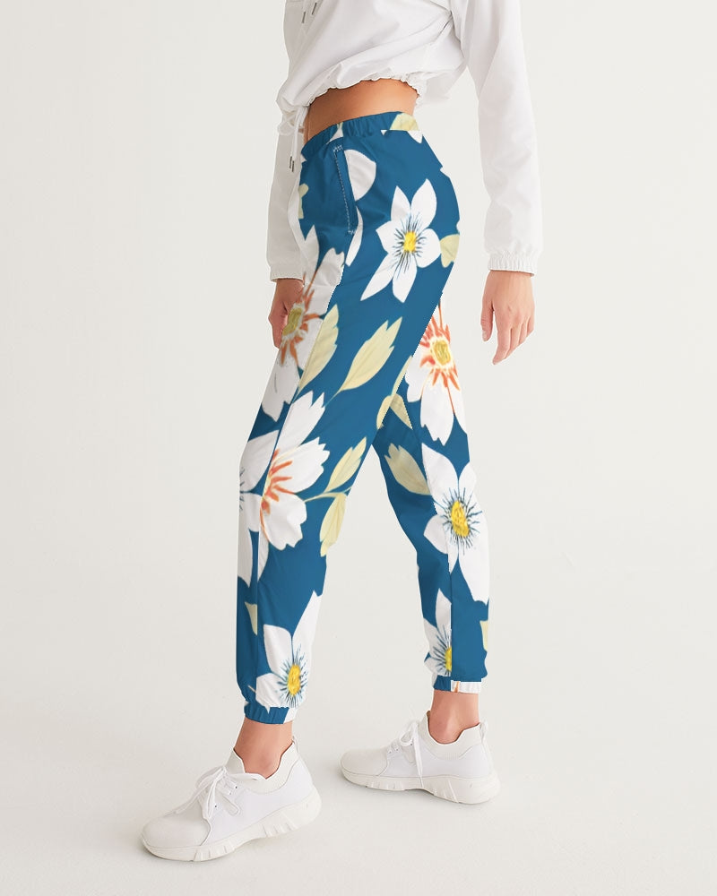 Dark blue background and white flower pattern Women's All-Over Print Track Pants