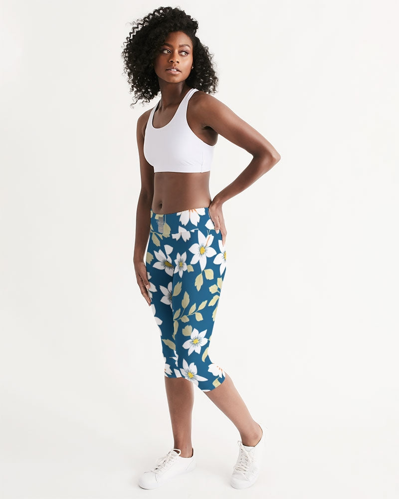 Dark blue background and white flower pattern Women's All-Over Print Mid-Rise Capri